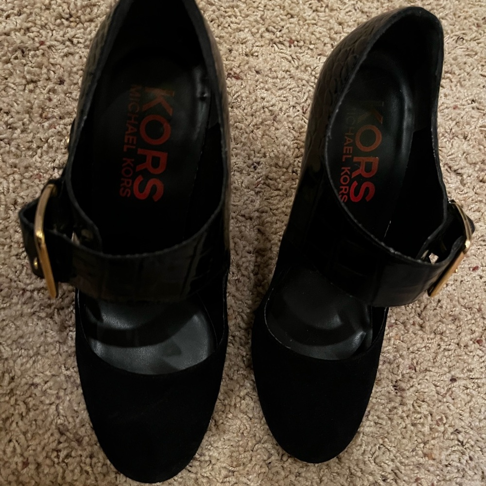 Kors by Michael Kors black heels with alligator print and gold buckle. Size 6.